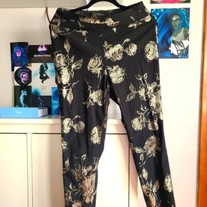 NY & Co. Pull on pants. Black with gold roses.